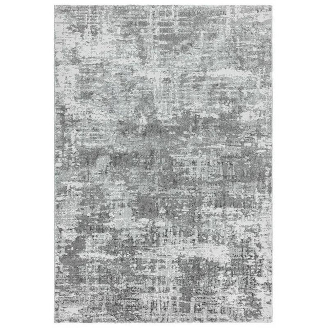 Grey abstract rug with textured pattern and soft pile, shown from above