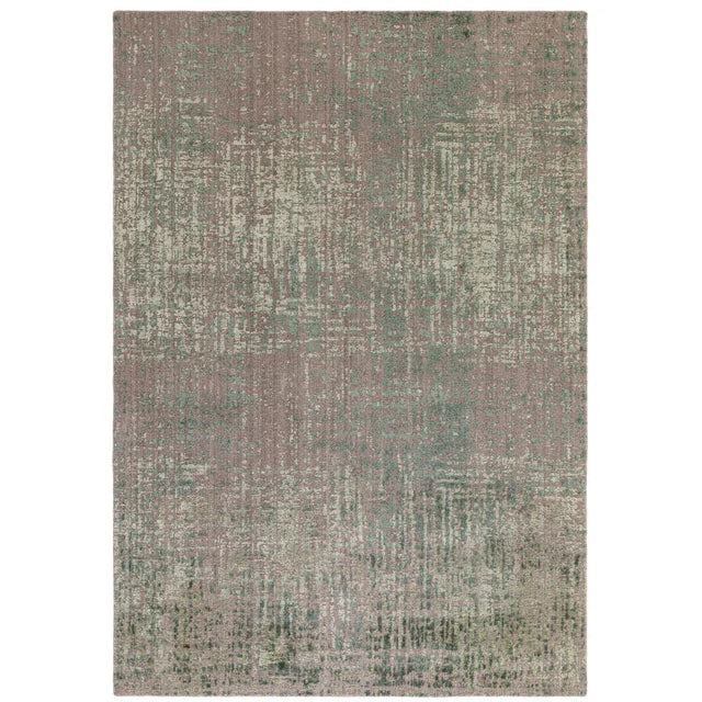 Distressed pattern area rug in muted green and beige tones, rectangular, shown from above