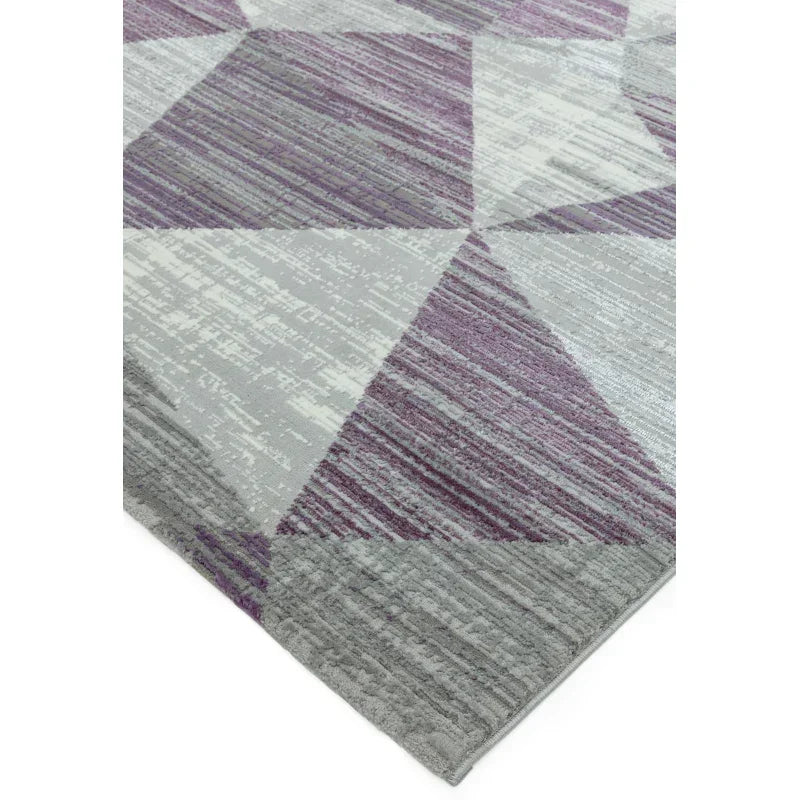 Grey and purple geometric patterned rug corner view