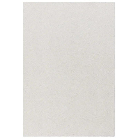 Rectangular cream area rug with soft textured surface