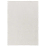 Rectangular cream area rug with soft textured surface