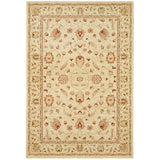 Traditional cream area rug with intricate red and beige floral pattern and decorative border