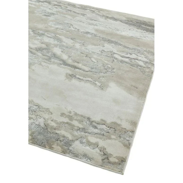 Modern area rug with grey and beige abstract pattern, angled corner view