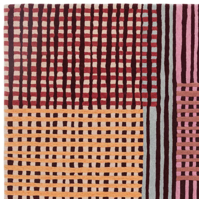 Modern area rug with geometric striped patterns in burgundy, beige, and orange tones