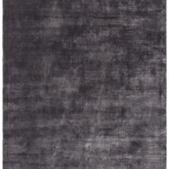 Charcoal grey area rug with a soft velvet texture and subtle tonal shading