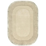 Oval beige area rug with plush border and soft textured surface