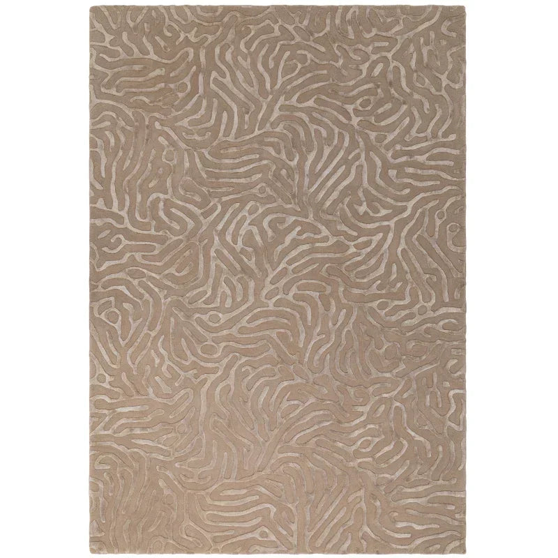 Beige patterned area rug with raised texture and abstract swirl design