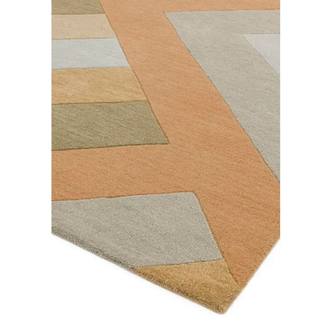 Geometric pattern rug in beige, tan and grey wool, corner angle view