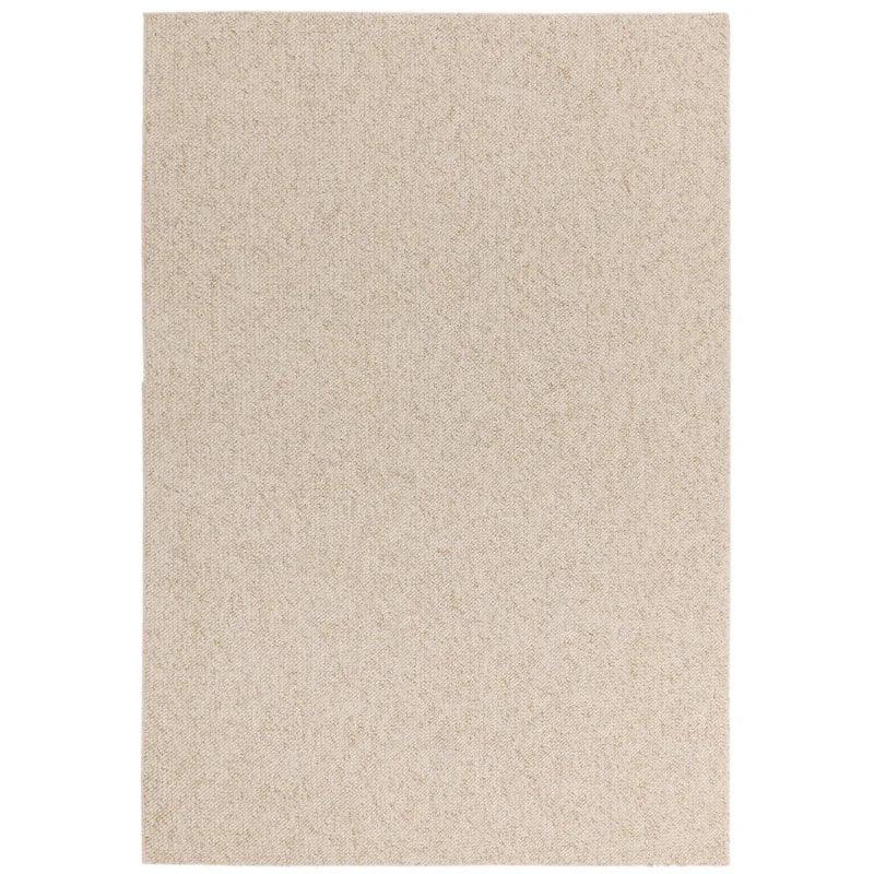 Rectangular cream area rug with textured weave and plain border