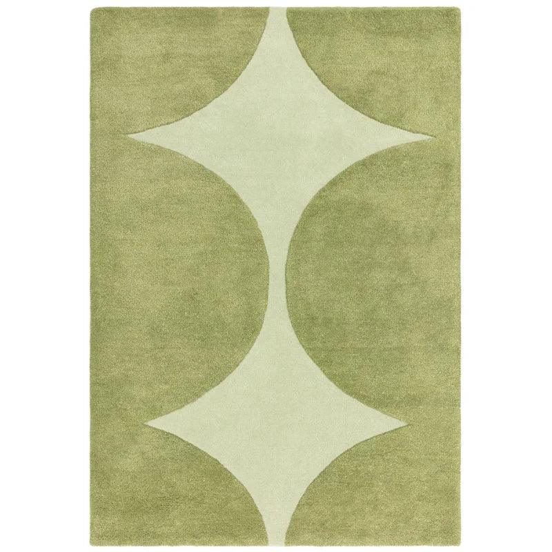 Green area rug with modern geometric pattern and soft textured surface