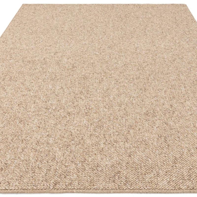 Beige woven rug with textured pile and finished edges, shown from low front angle