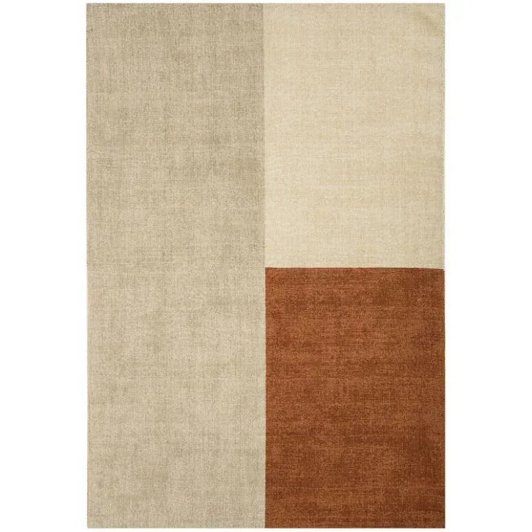 Modern area rug with beige, cream, and terracotta geometric color blocks