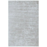 Light grey rectangular area rug with soft texture and subtle sheen