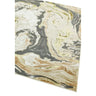 Abstract marble pattern area rug with beige, grey, and gold tones, angled corner view