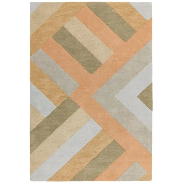 Geometric patterned area rug in peach, beige, and sage tones with intersecting lines