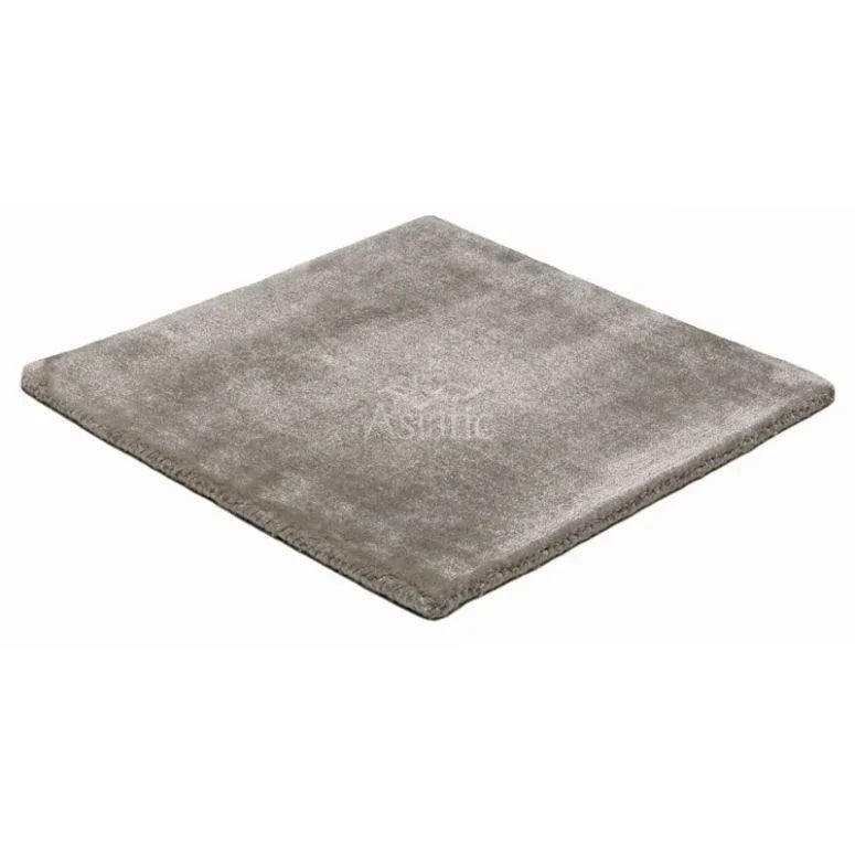Grey rectangular area rug with soft texture shown at an angle