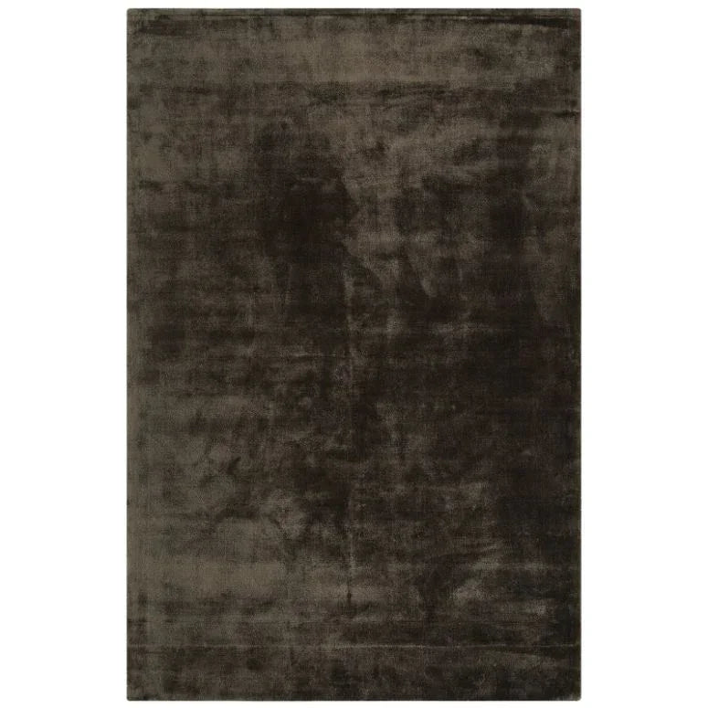 Dark brown velvet area rug with plush texture and rectangular shape