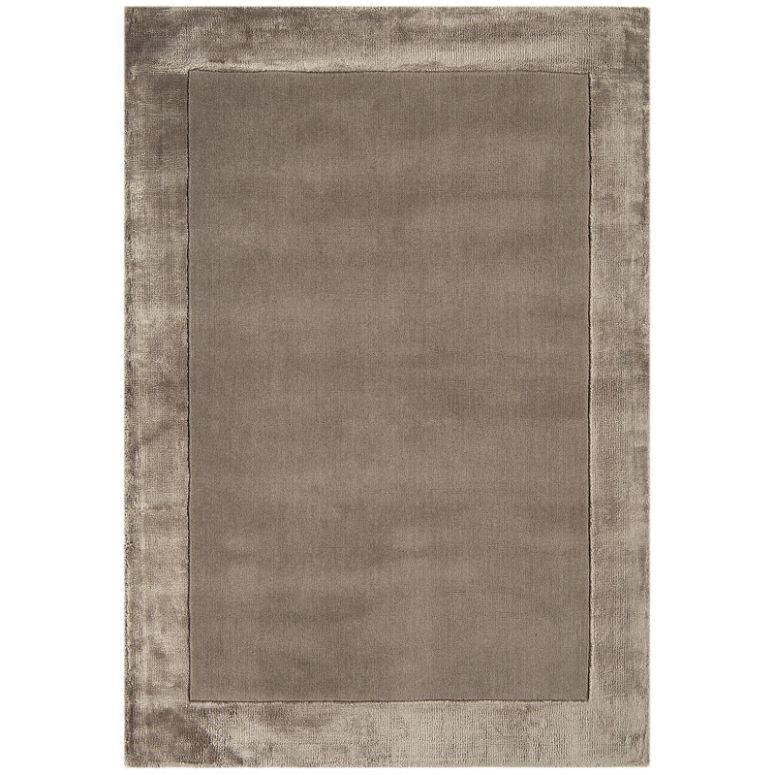 Taupe rectangular area rug with subtle border design and soft texture