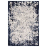 Navy and cream distressed area rug with abstract pattern