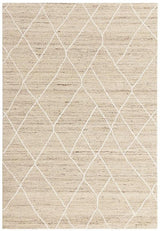 Beige area rug with subtle white geometric diamond pattern
