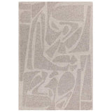 Beige area rug with abstract geometric pattern and textured pile, shown from overhead view