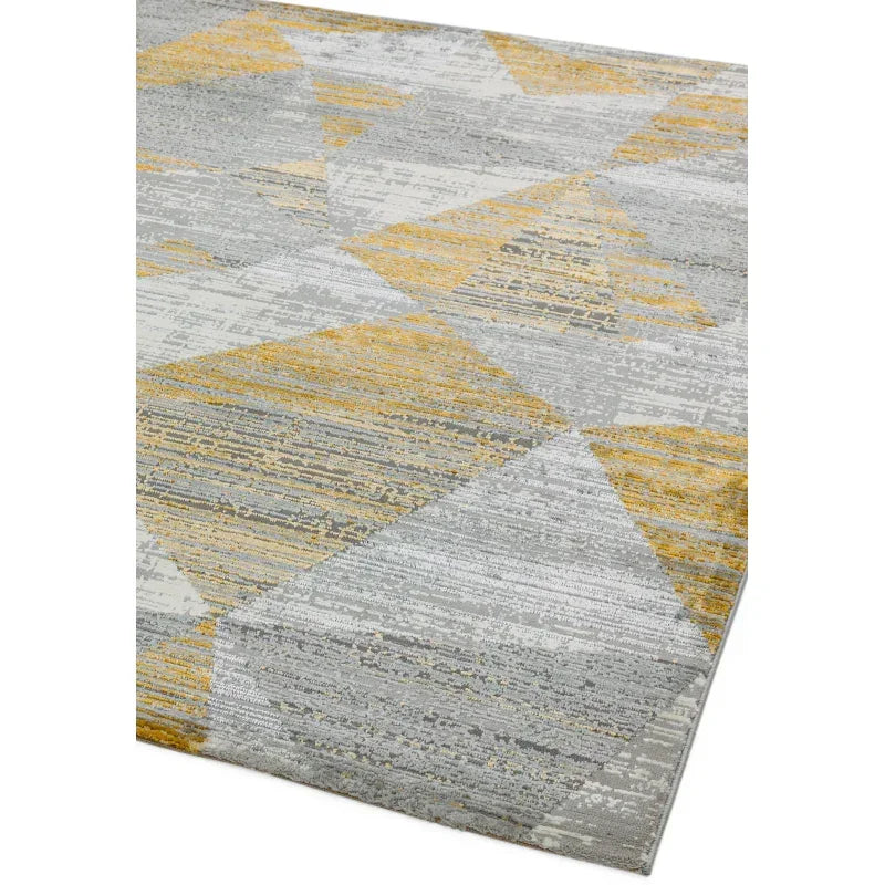 Grey and yellow geometric area rug with textured triangular patterns