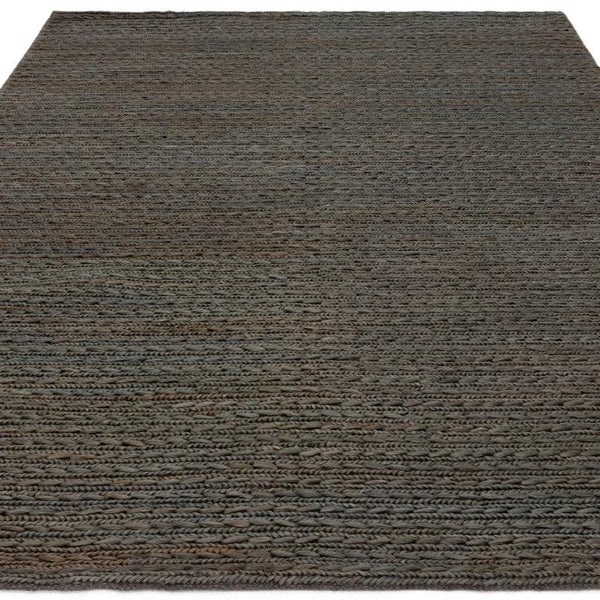 Handwoven grey wool rug with braided texture and rectangular shape
