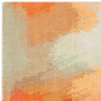 Modern abstract area rug with orange, beige, and light blue pattern