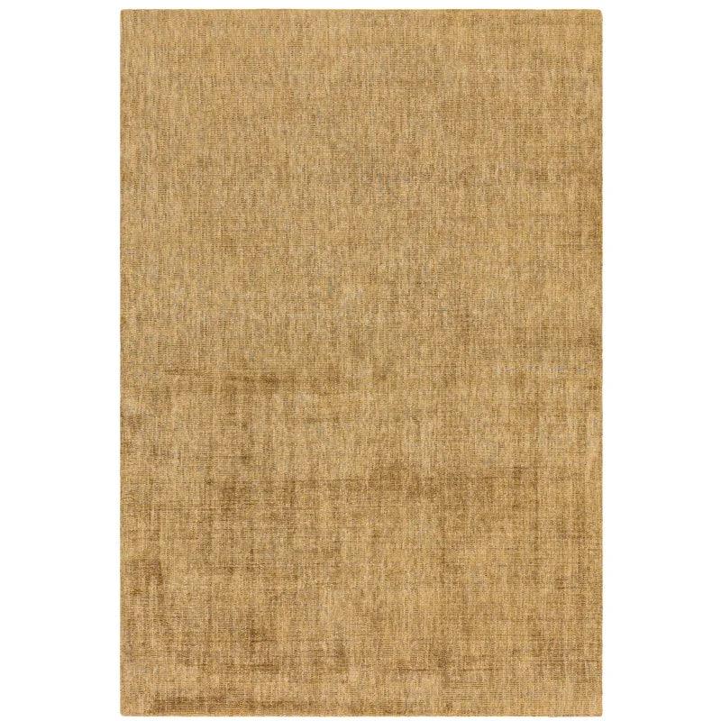 Rectangular beige area rug with subtle woven texture and soft finish