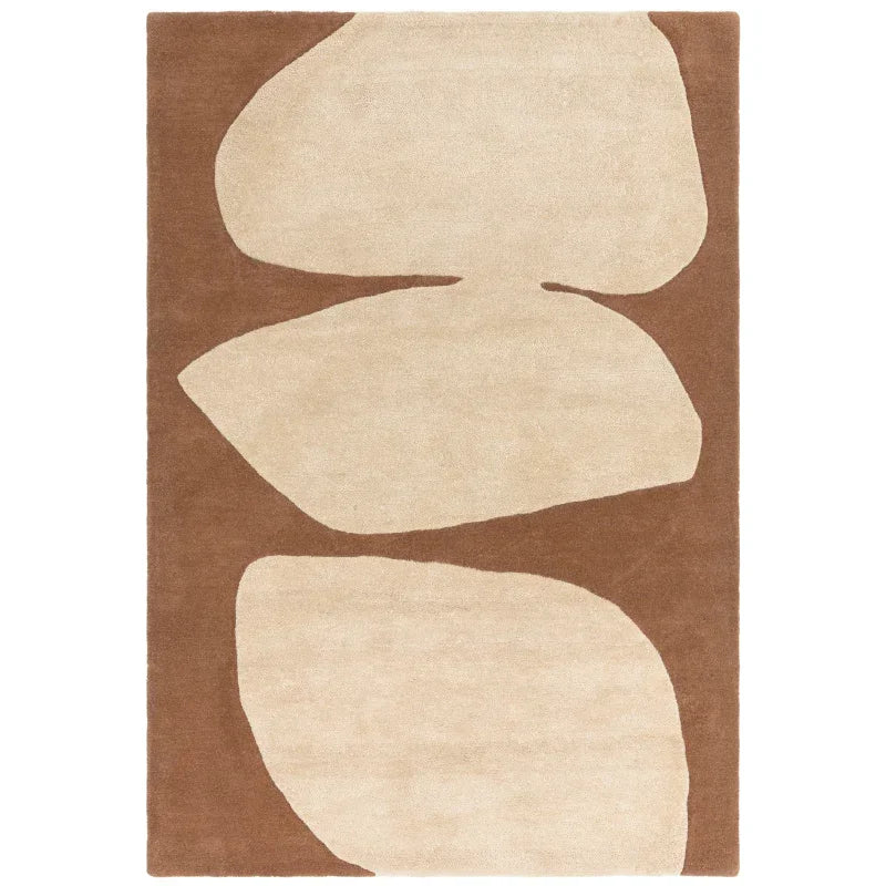 Modern area rug with abstract cream shapes on a brown background, rectangular design