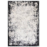 Modern area rug with distressed black and grey border on a light background