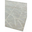 light grey modern rug with abstract linear pattern and textured finish, angled view