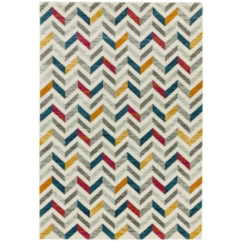 Chevron patterned area rug with grey, yellow, red, and blue accents