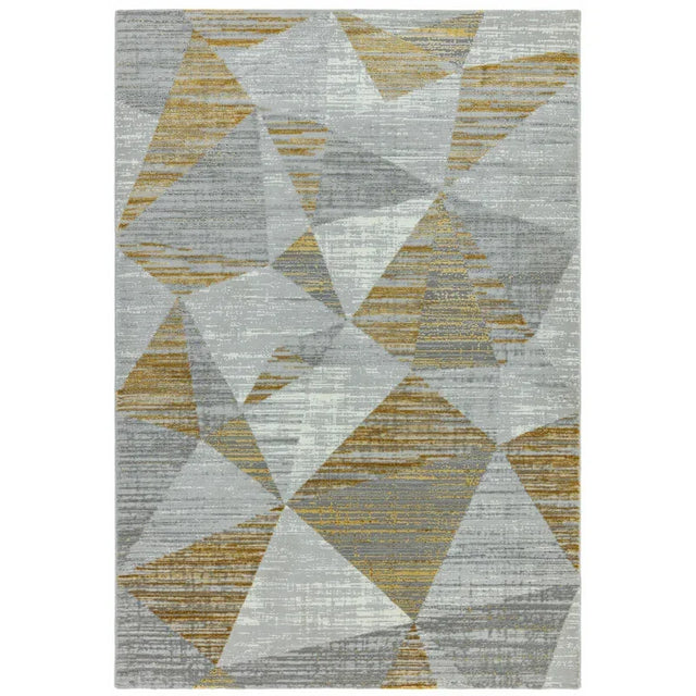 Geometric patterned rug in grey and gold tones, featuring abstract angular shapes