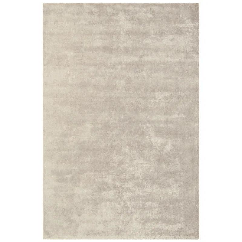 Rectangular beige area rug with soft texture and subtle sheen on white background