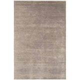 Large rectangular beige area rug with subtle textured pattern and short pile