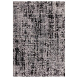 Rectangular area rug with abstract black and grey pattern and textured surface