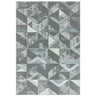 Grey geometric pattern rug with abstract triangles and textured detailing