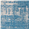 blue and cream abstract patterned area rug close up