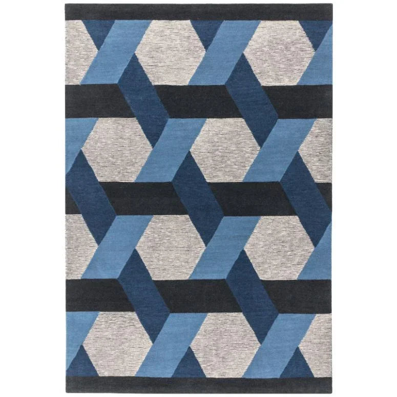 Blue and grey geometric pattern rug with interlocking shapes viewed from above