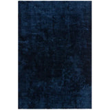 Rectangular dark blue velvet rug with subtle textured pattern