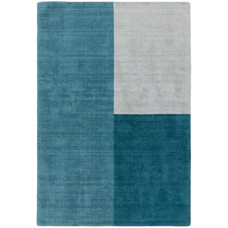 Blue and grey geometric area rug with large color block pattern