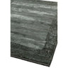 Corner of a modern grey area rug with textured pattern and soft finish