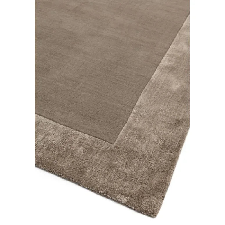 Taupe wool and viscose area rug with textured border, corner angle view