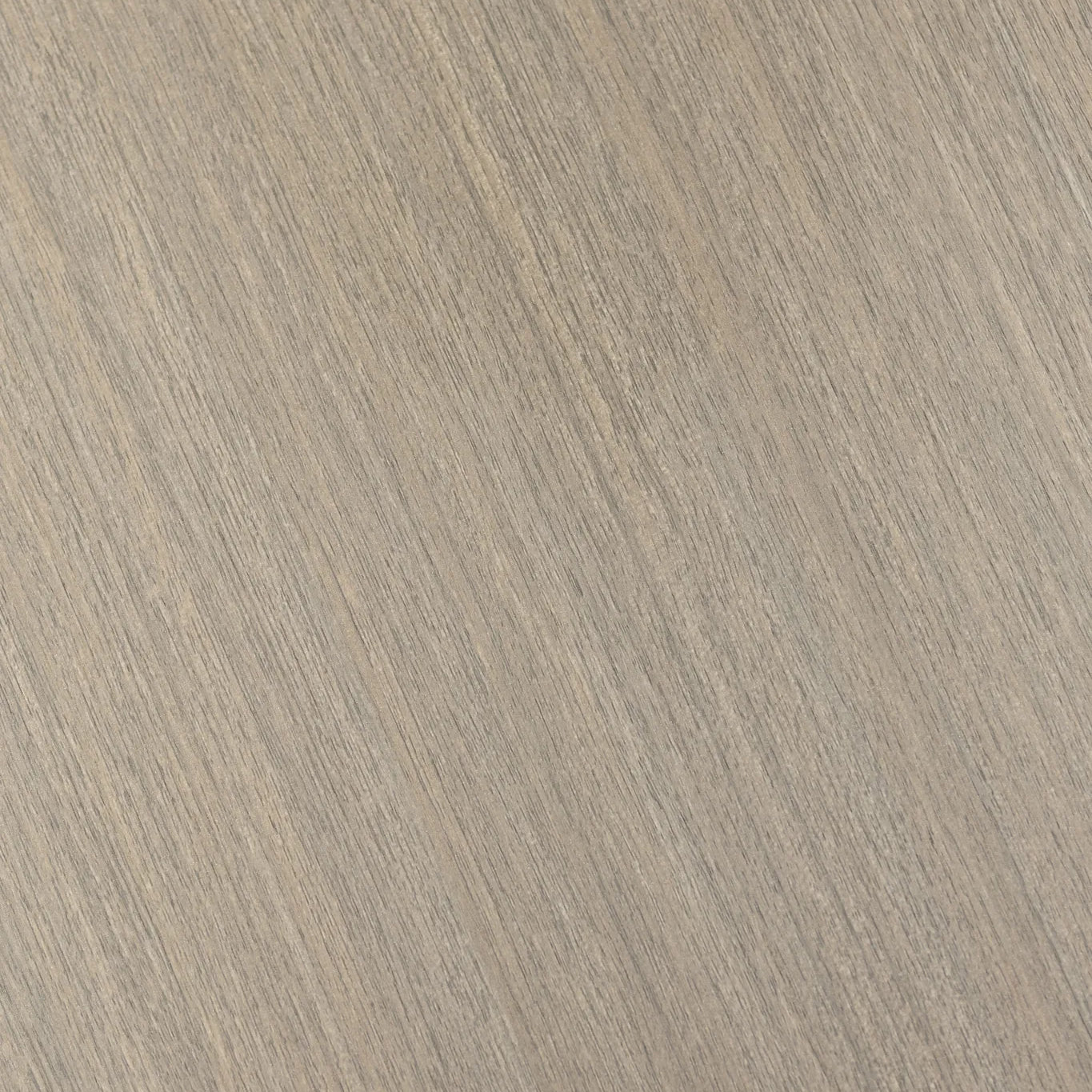 A close-up texture of a light beige wood grain surface with fine diagonal lines.
