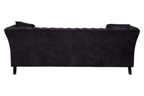Three-seat sofa upholstered in grey velvet with a sleek, curved backrest and subtle tufting details. The sofa features tapered black legs, providing a modern and elegant look suitable for various interior styles
