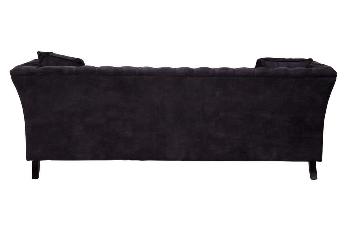 Three-seat sofa upholstered in grey velvet with a sleek, curved backrest and subtle tufting details. The sofa features tapered black legs, providing a modern and elegant look suitable for various interior styles