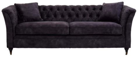 Three-seat sofa upholstered in grey velvet with a tufted backrest and two matching cushions, featuring elegant curved arms and tapered wooden legs