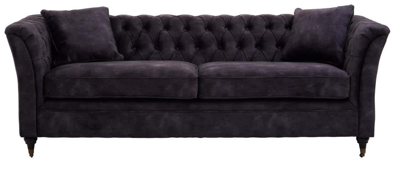 Three-seat sofa upholstered in grey velvet with a tufted backrest and two matching cushions, featuring elegant curved arms and tapered wooden legs