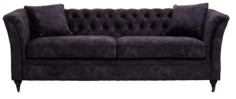 Three-seat sofa upholstered in grey velvet with a tufted backrest and two matching cushions, featuring elegant curved arms and tapered wooden legs